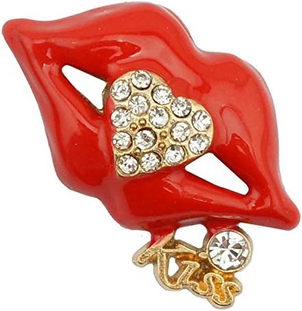 Close-up of a clear crystal gold tone lips brooch highlighting its design.