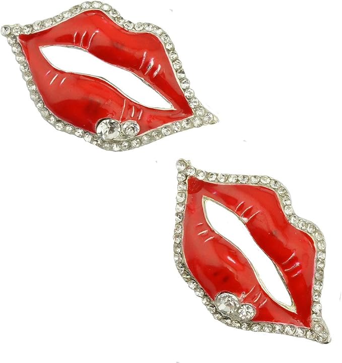 Close-up of a silver tone brooch featuring a crystal lips design.