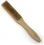 Suede shoe brush displayed with a clean suede shoe