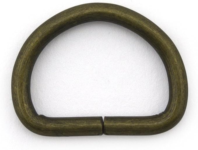 Close-up of a 2.5cm antique gold metal D-Ring.