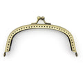 Gold colour rounded square purse frame with kiss clasp.