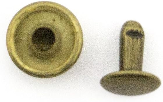 Display of antique gold press studs in packaging