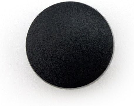 Press studs in use on a fabric jacket showcasing their application.