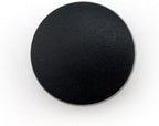 Press studs in use on a fabric jacket showcasing their application.