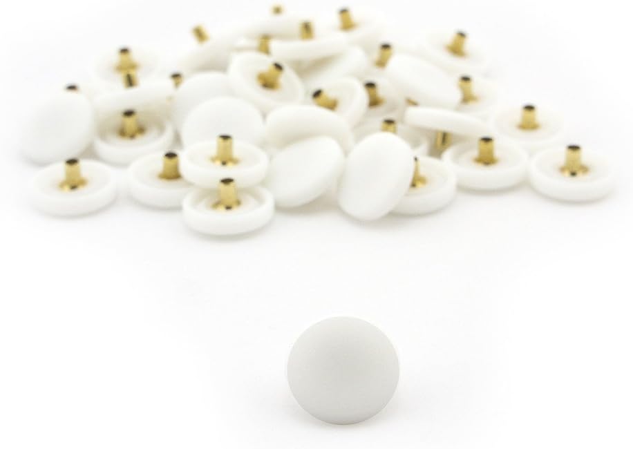 Close-up of a 12.5mm white plastic press stud