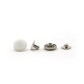 Pack of 20 white plastic press studs displayed
