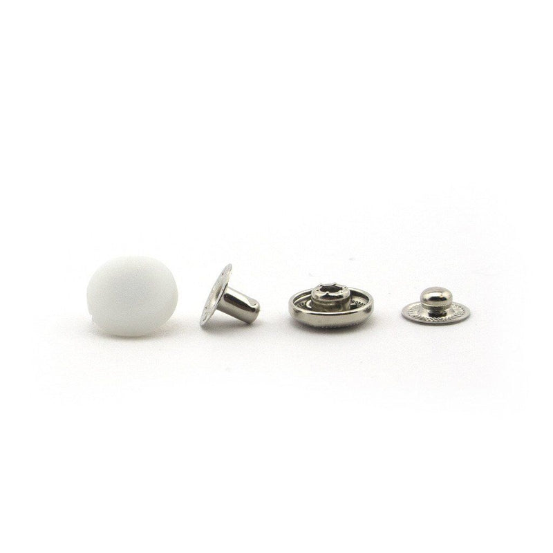 Pack of 20 white plastic press studs displayed