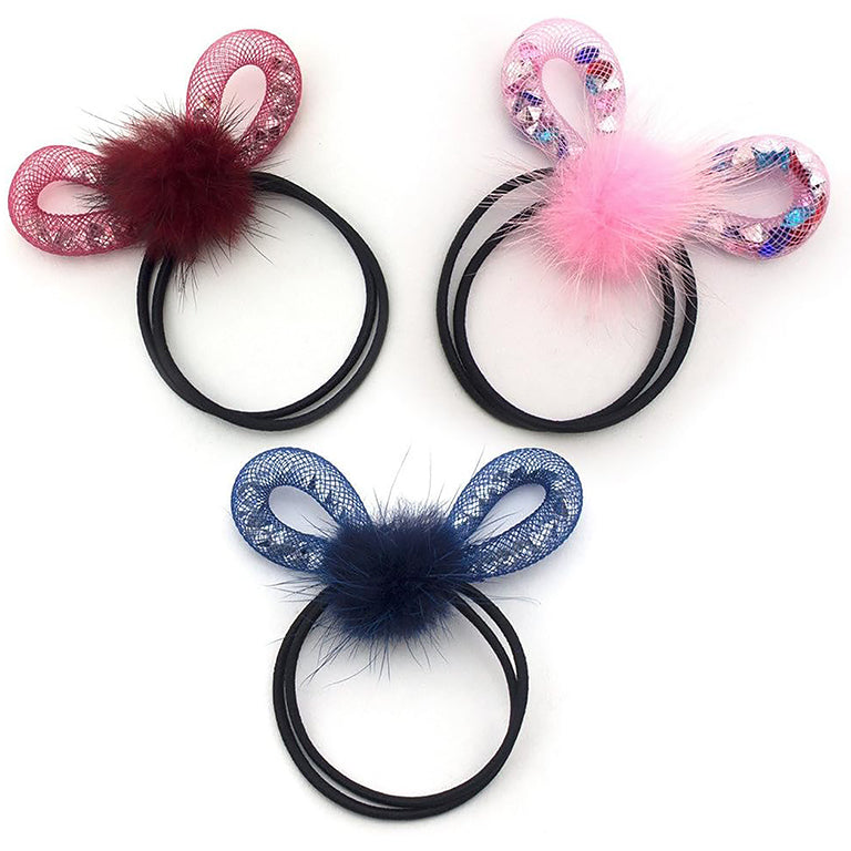 Three assorted hair bands with mink pompoms and rhinestone bows.