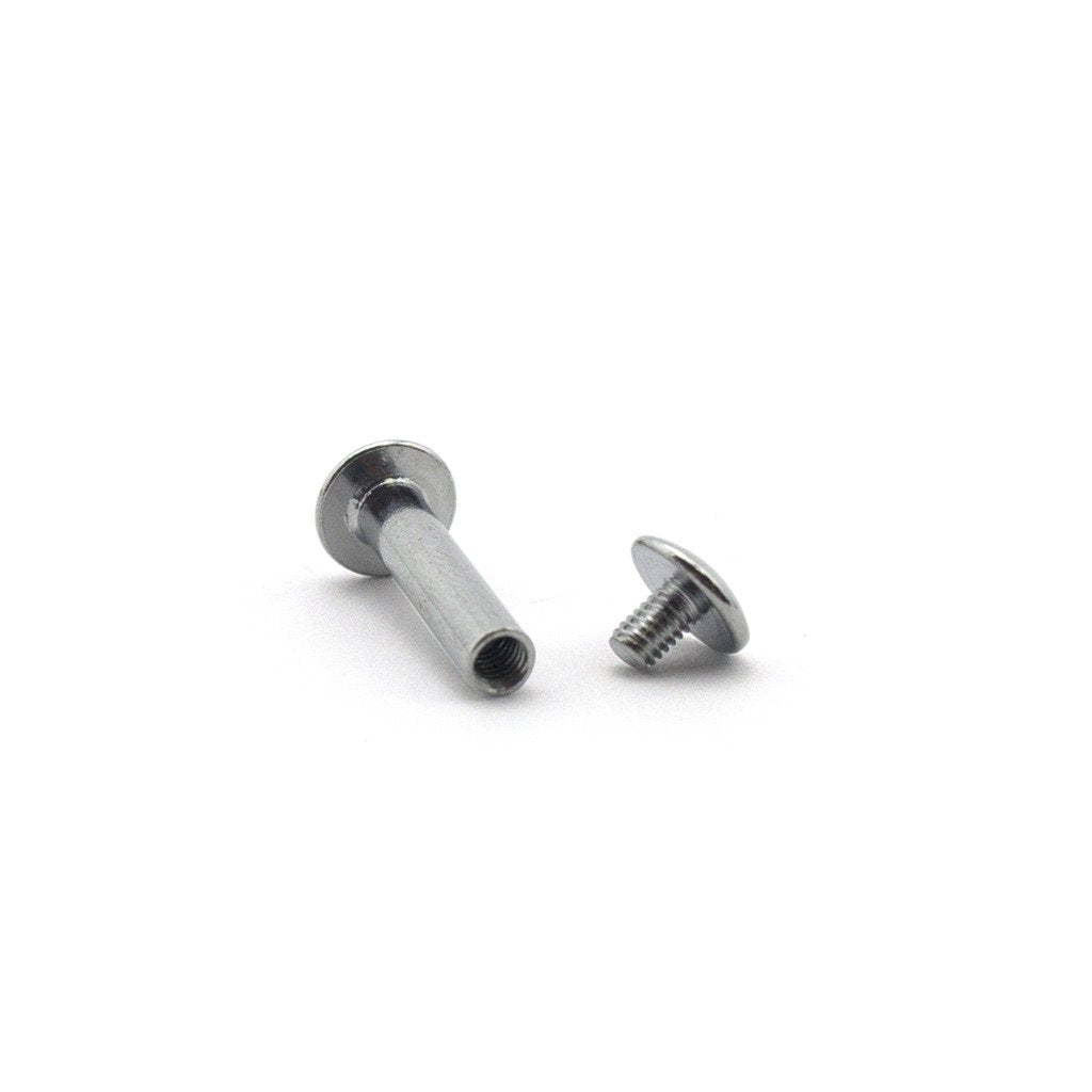 Close-up of silver tone binding screw in stud with dimensions