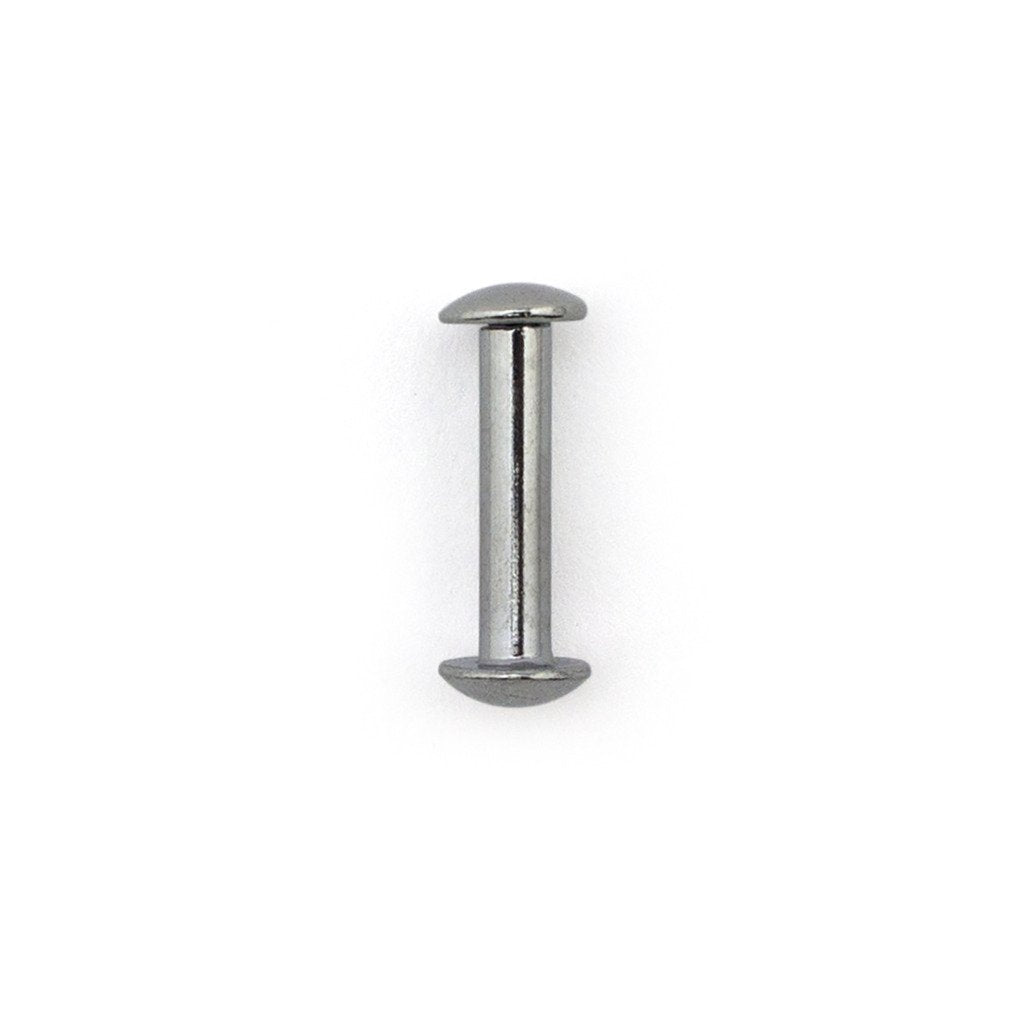 Variety of silver screw in studs arranged on a surface