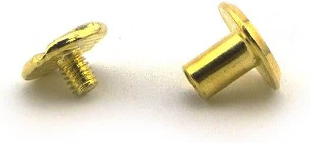 Gold screw in studs displayed on a fabric background.