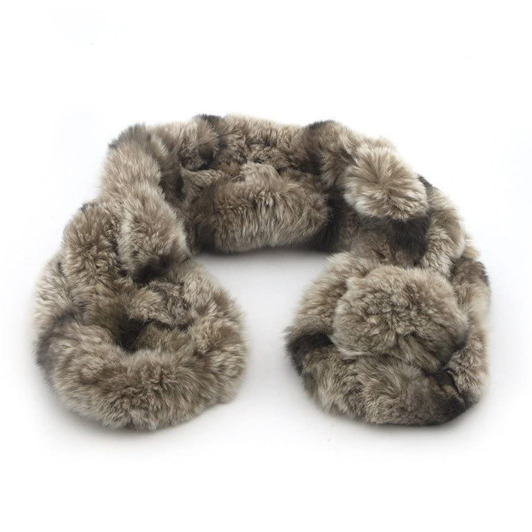 Close-up of the brown rabbit fur scarf showcasing its soft texture.