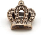 Gold colour crown trims displayed on a fabric background
