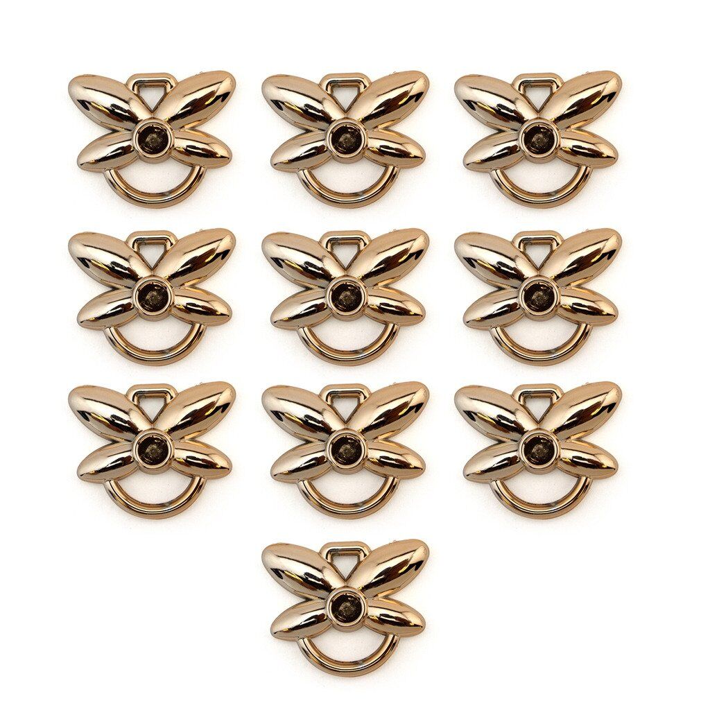Gold colour butterfly double loops trims on a white background.