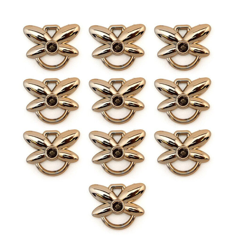 Gold colour butterfly double loops trims on a white background.