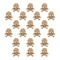 Pack of 20 gold colour skull and crossbones trims displayed