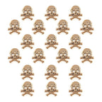 Pack of 20 gold colour skull and crossbones trims displayed