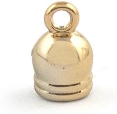 Close-up of a small gold bell trim showing its colour and shape