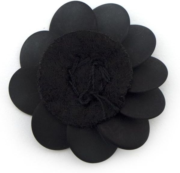 Sew-on black beads flower trim showcased on fabric.