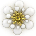 Pack of five white flower sew-on trims displayed together.
