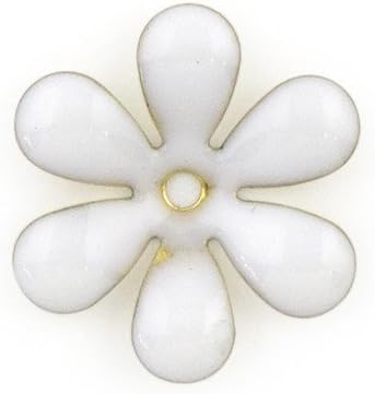 Close-up of white enamel flower sew-on trim on fabric.