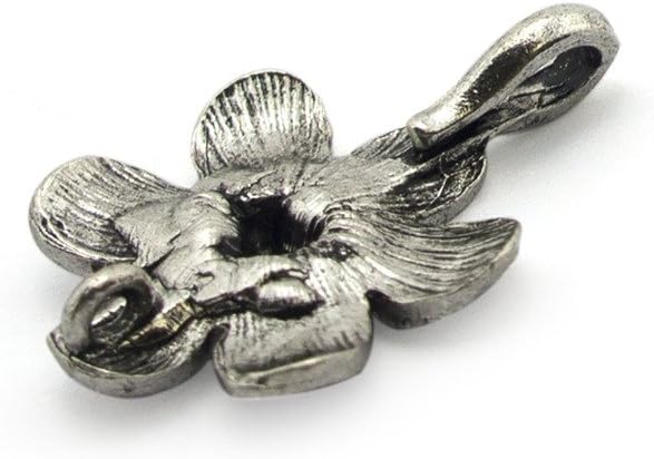 Close-up of a silver flower pendant showing its intricate design.