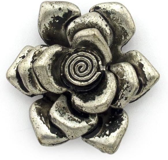 Silver flower pendants displayed for crafting and accessory use.