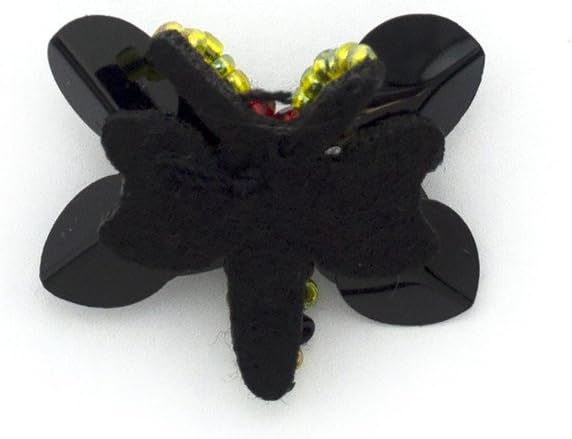 Close-up of butterfly sequin trim on a black felt base.