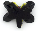 Close-up of butterfly sequin trim on a black felt base.