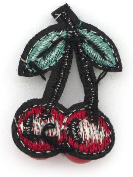 Close-up of red cherry trim featuring red beads.