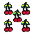 Red cherry embroidered sew-on trim with green crystals.