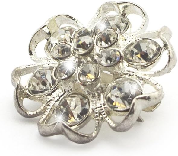 Close-up of a silver crystal diamante flower brooch showcasing intricate details.