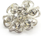 Close-up of a silver crystal diamante flower brooch showcasing intricate details.
