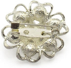 Side view of the 3D silver crystal diamante flower brooch highlighting its design.
