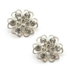 Two elegant 3D silver crystal diamante flower brooches displayed together.