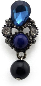 Close-up of blue black bead and crystal brooch pin details