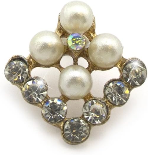 Brooch pin on a fabric background highlighting its sparkle.