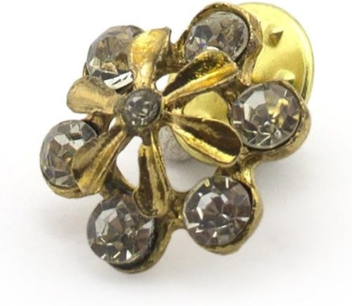 Close-up of the gold diamante crystal flower brooch pin detailing.