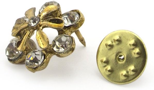 Two gold diamante crystal flower brooch pins displayed together.