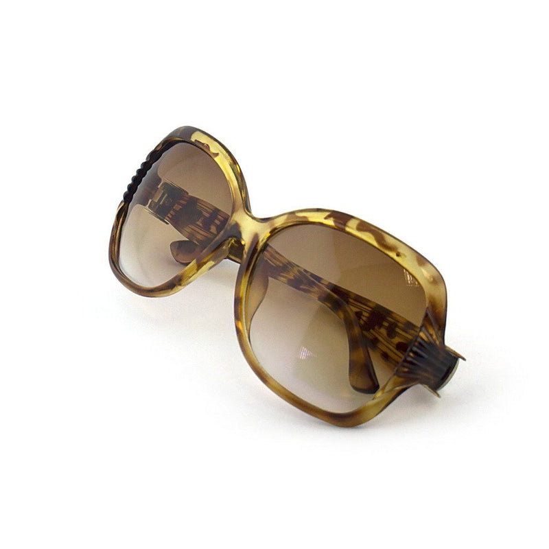 Stylish ladies' sunglasses with brown animal print design.