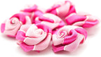Close-up of small flower embellishments made from ribbon and organza.