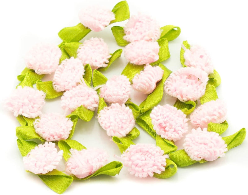 Pretty ribbon bow trim with fringe flowers in pale baby pink.