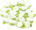 White ribbon bow trim with detailed fringe flowers for sewing.
