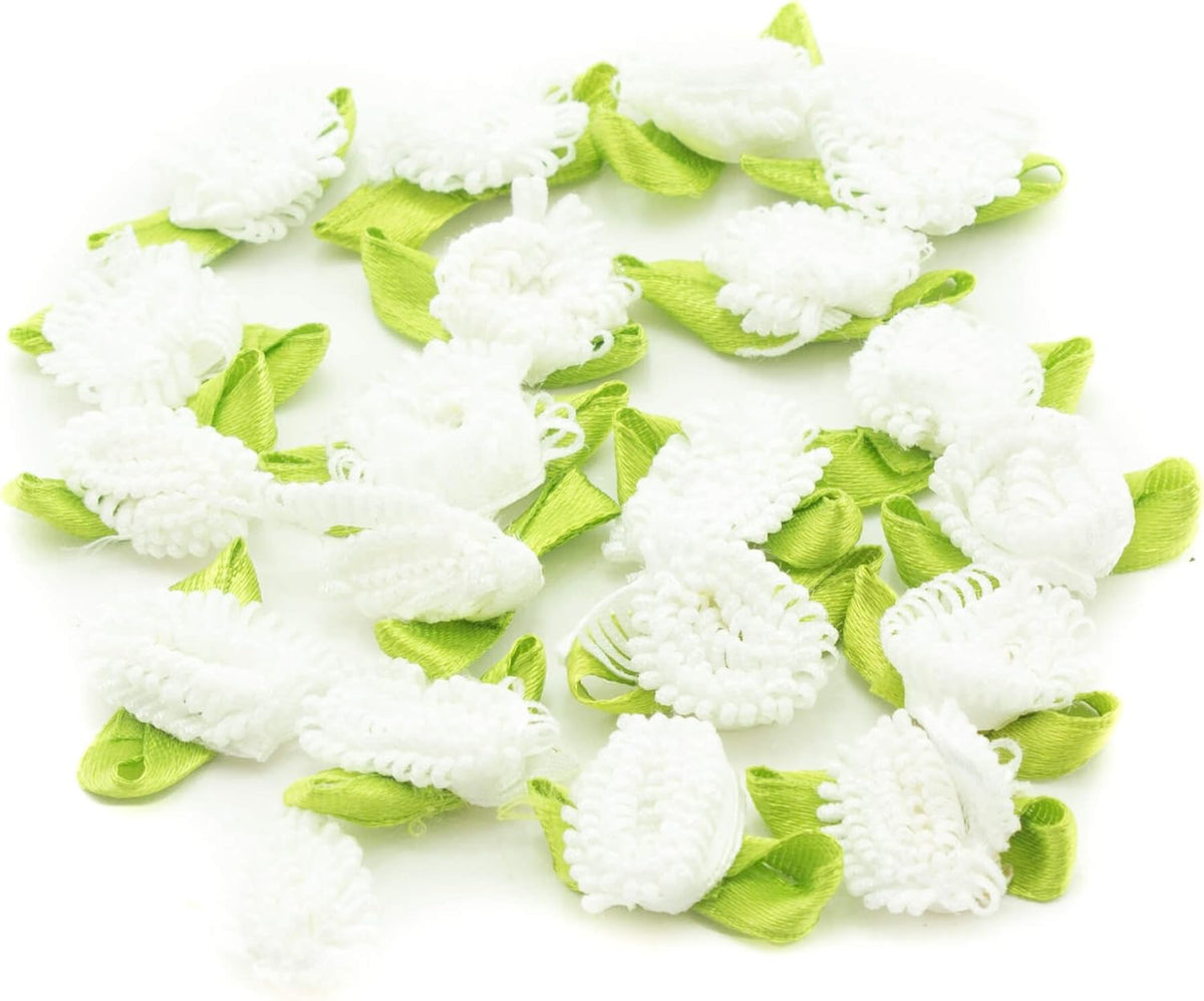 White ribbon bow trim with detailed fringe flowers for sewing.