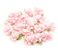 Pale baby pink ribbon bow sew on trim with flower detail.