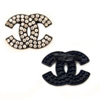 Stylish XNE-002 Pin Brooch with White Diamante Crystals in a Black Metal Frame Setting - 3 cm x 2 cm