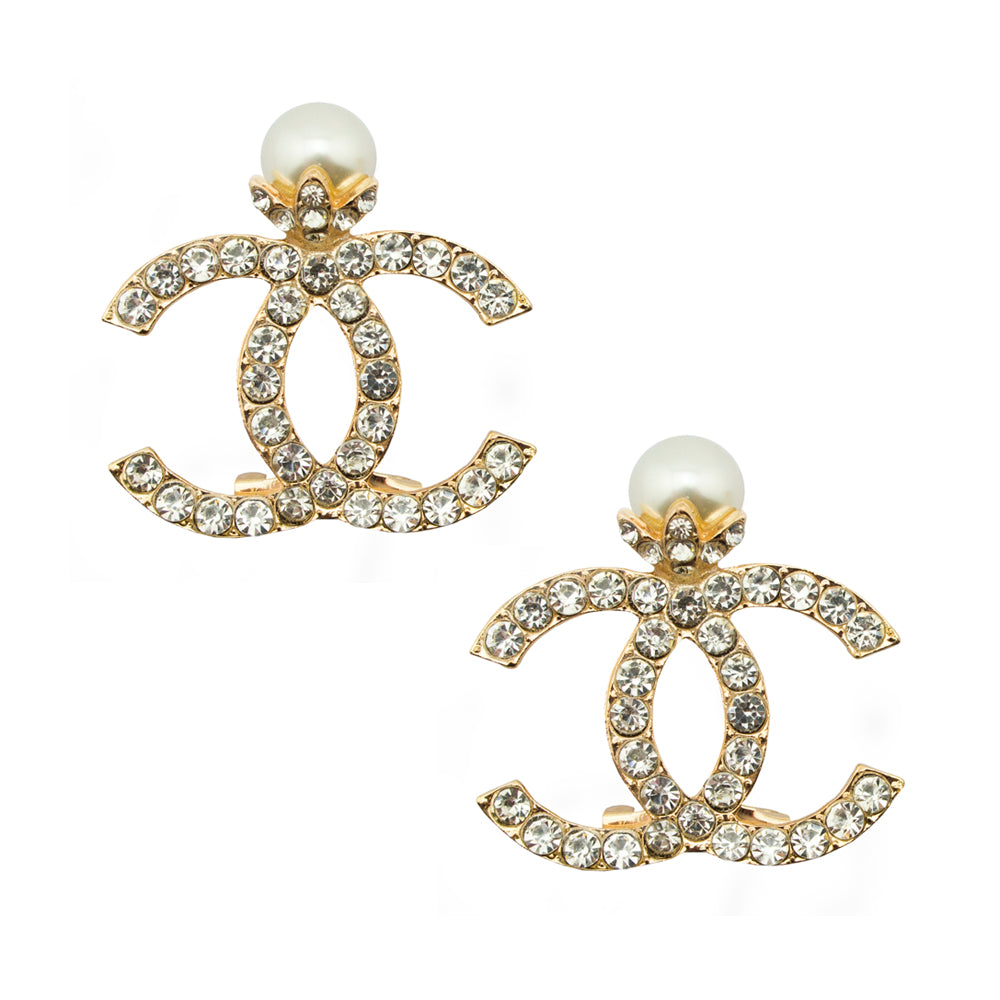 Two elegant crystal inlaid brooches with pearl effect beads.