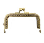 Antique brass coin purse frame with engraved flowers