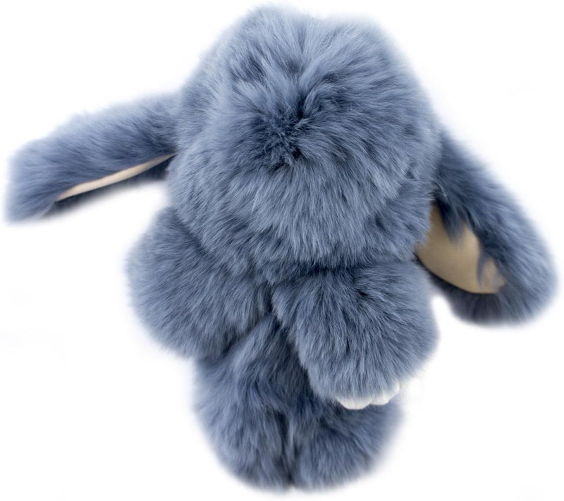 Large grey fluffy bunny rabbit keyring charm on a table.