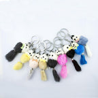 Cute little fox keyring featuring a gingham bow tie.